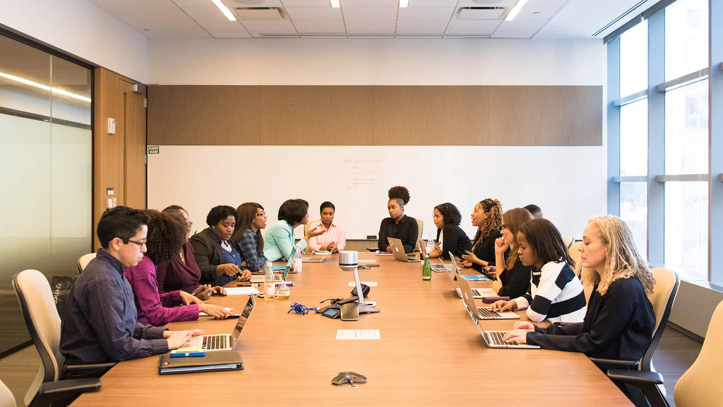 A group of people sitting around the table