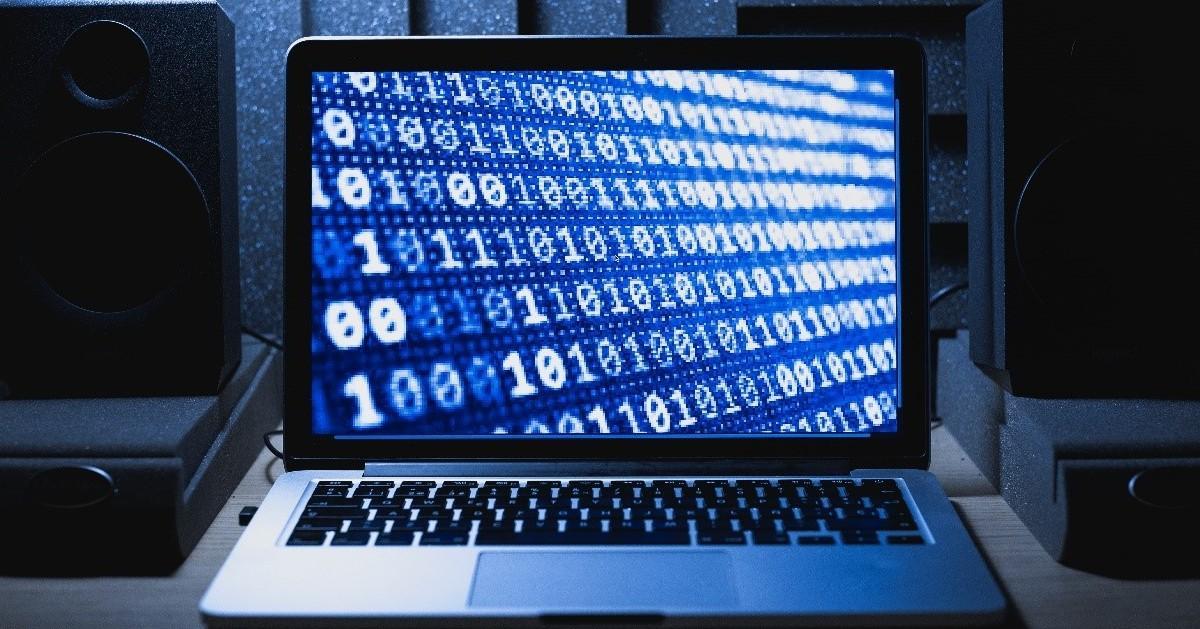 Computer with binary numbers on the screen