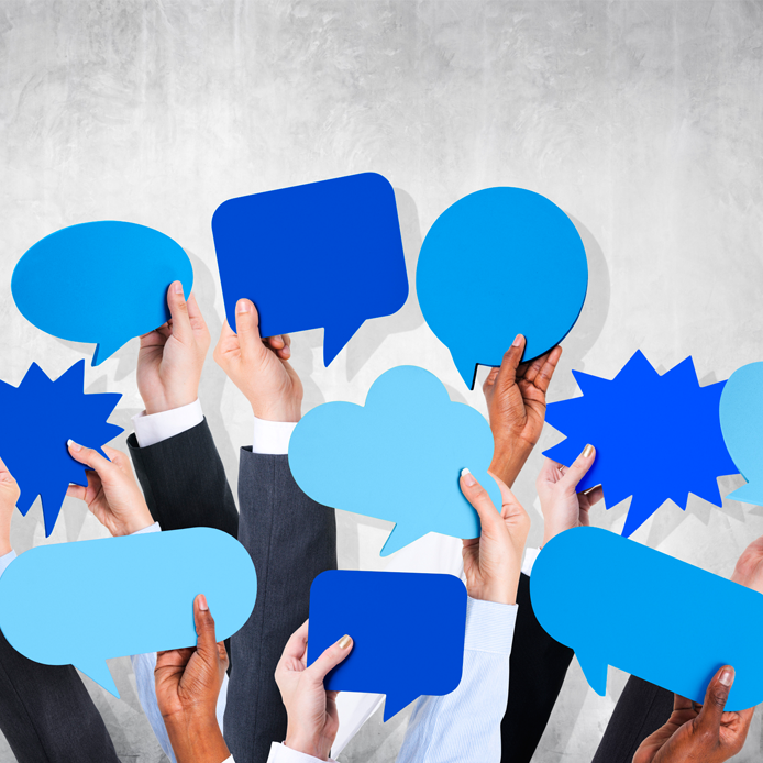 Business arms lifted with bubble help by a wall