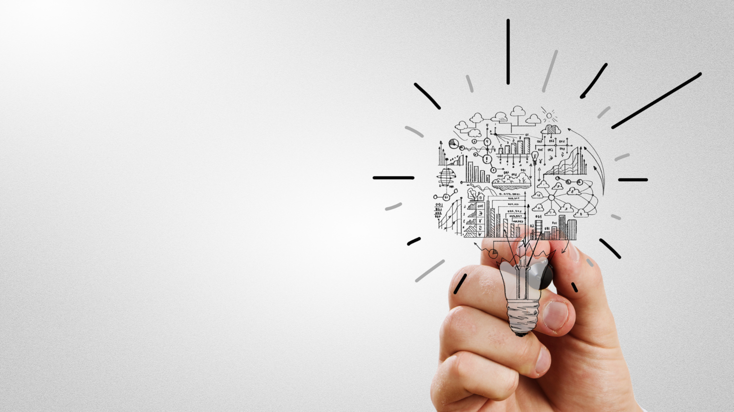 hand holding illustration of a lightbulb