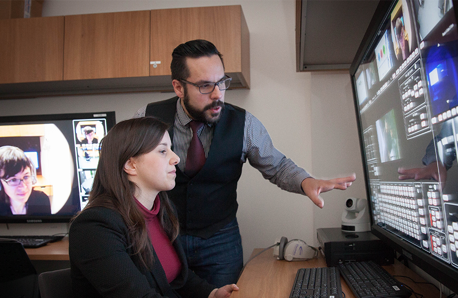 Dr. Simon Beaudry with an Inspire Laboratory user.