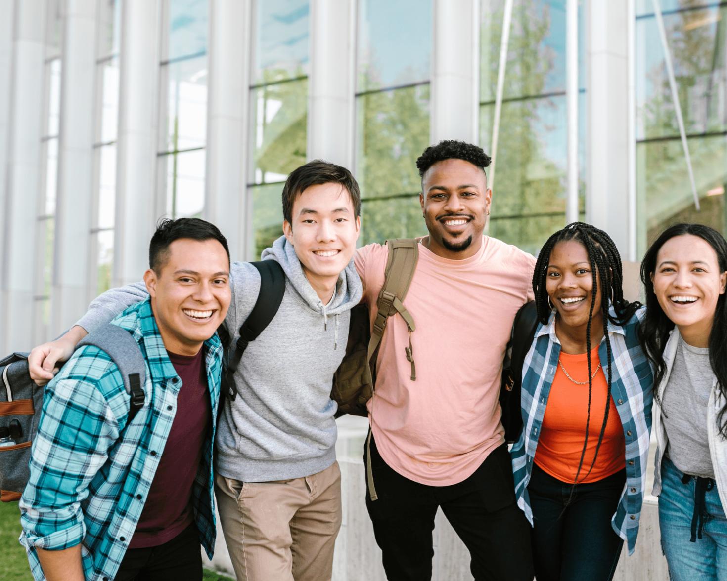 five students standing next to each other