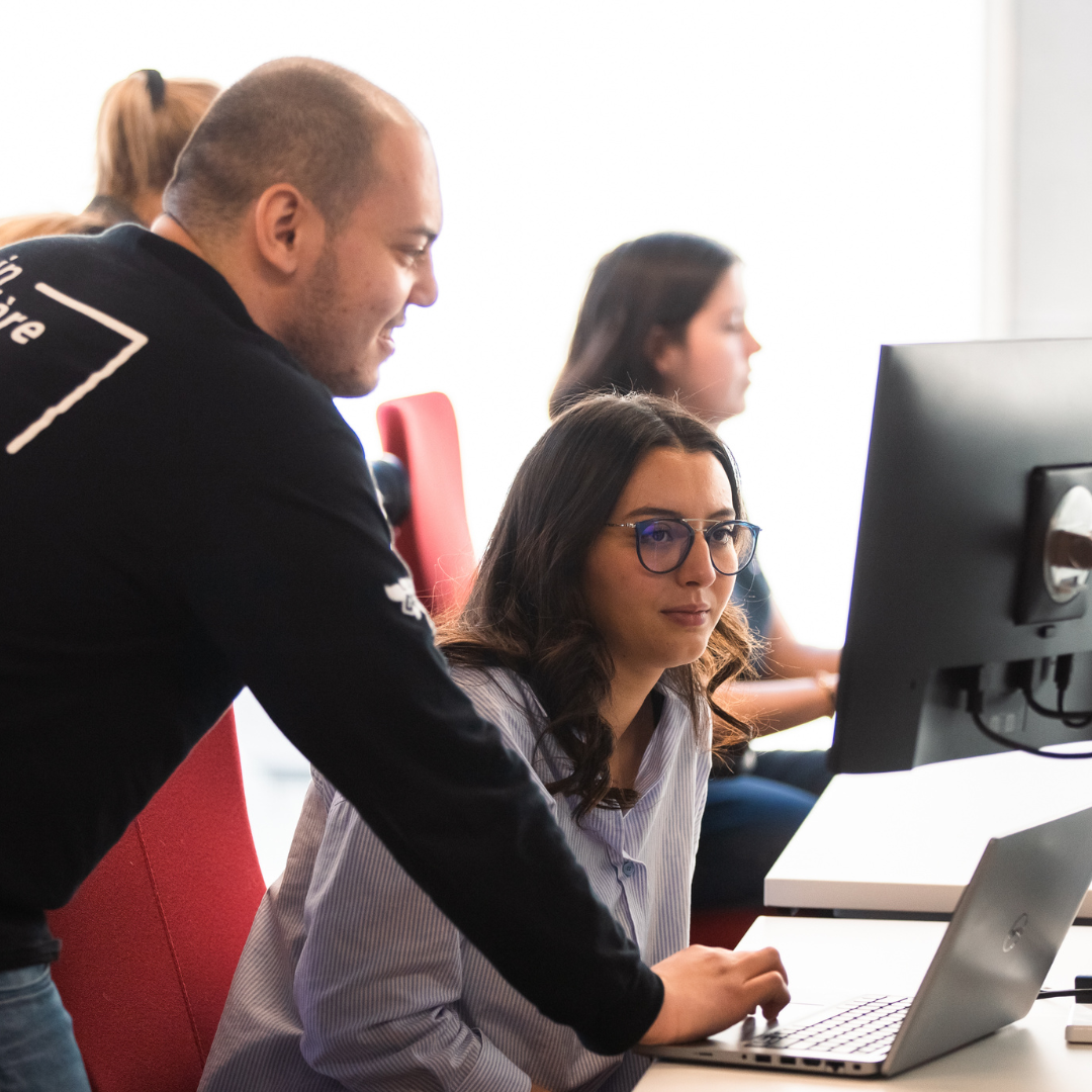 two people collaborating on a project