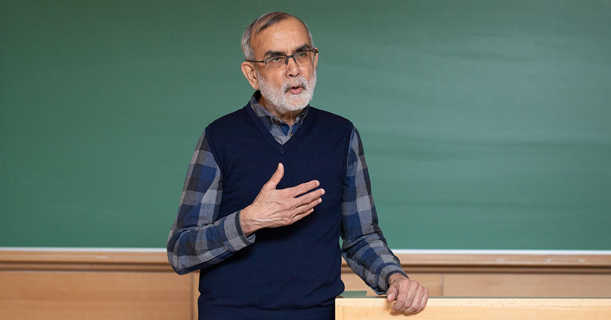 Professor Fayyaz Baqir in front of a classroom
