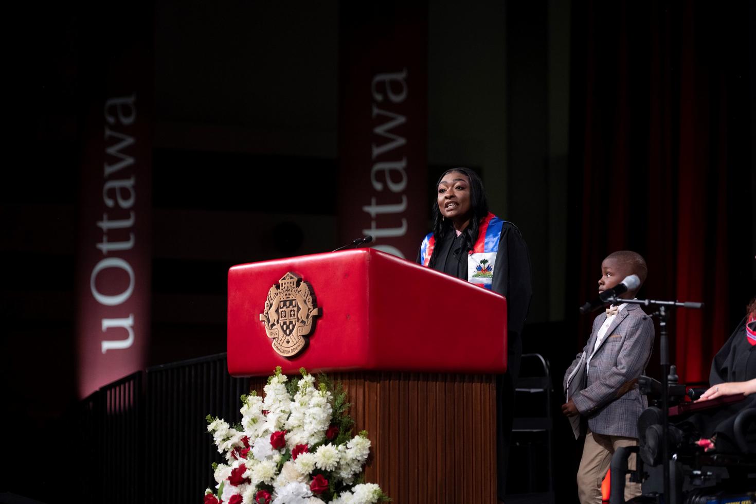 Kenchina during convocation giving her valedictorian speech 