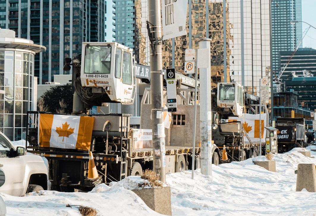 Convoy trucks parked along road