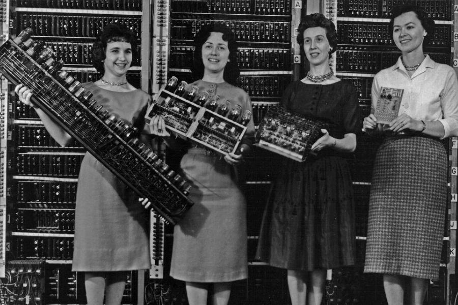 Archive photo of students holding equipment