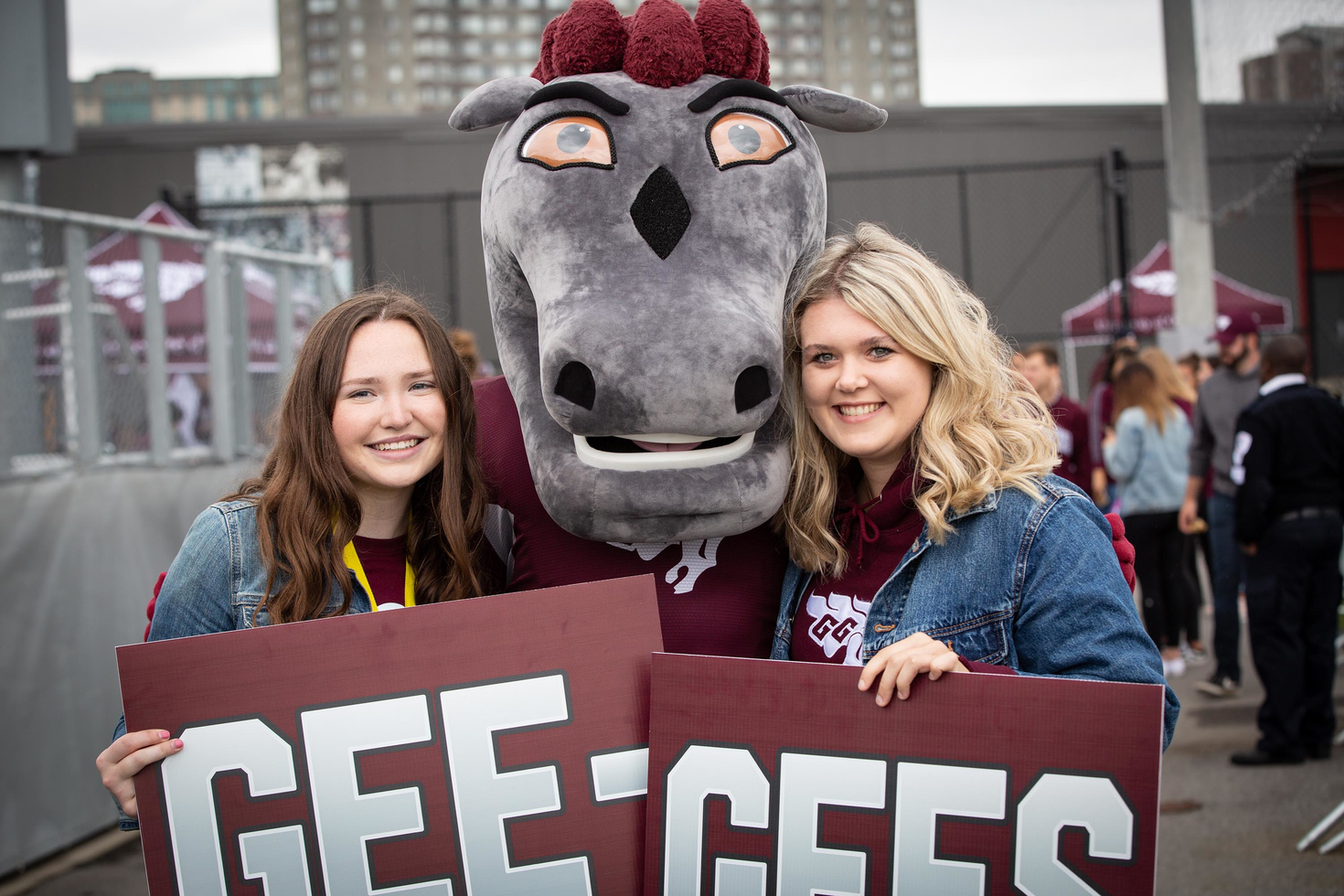 Gee-Gees mascot with fans
