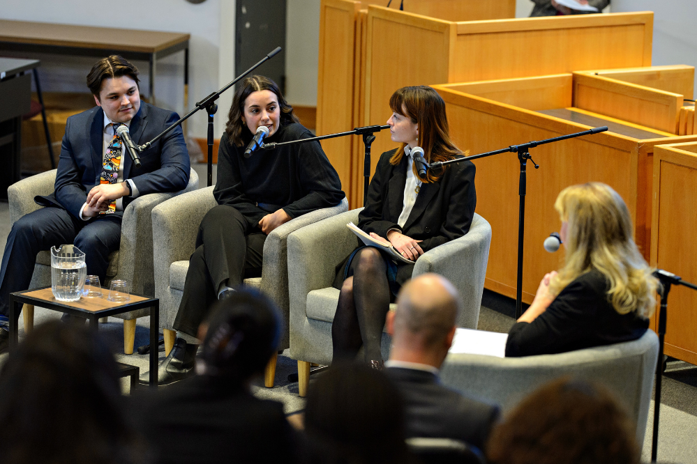 three students in interview with supreme court justice the Honourable Mary Moreau