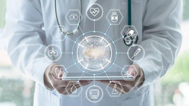 Image of a person in whitecoat holding an iPad