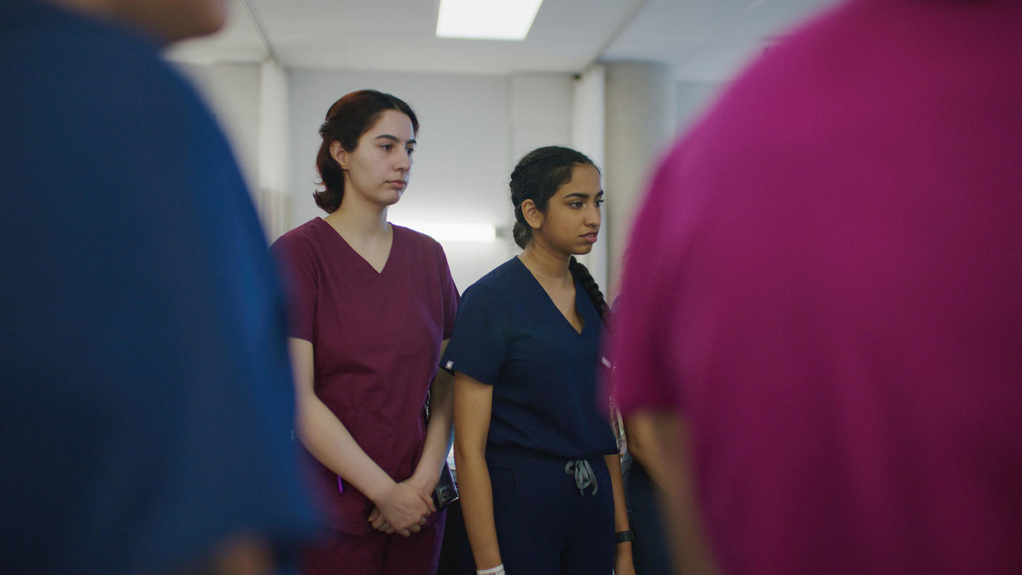 Two nursing student standing