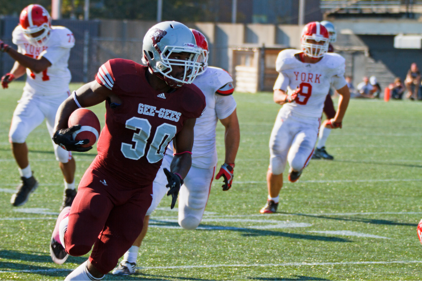 Franck in action as a running back for the Gee-Gees