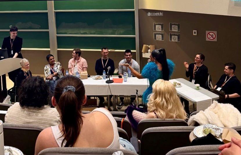 An audience listens to panellists at the Queer Health Summit April 22.