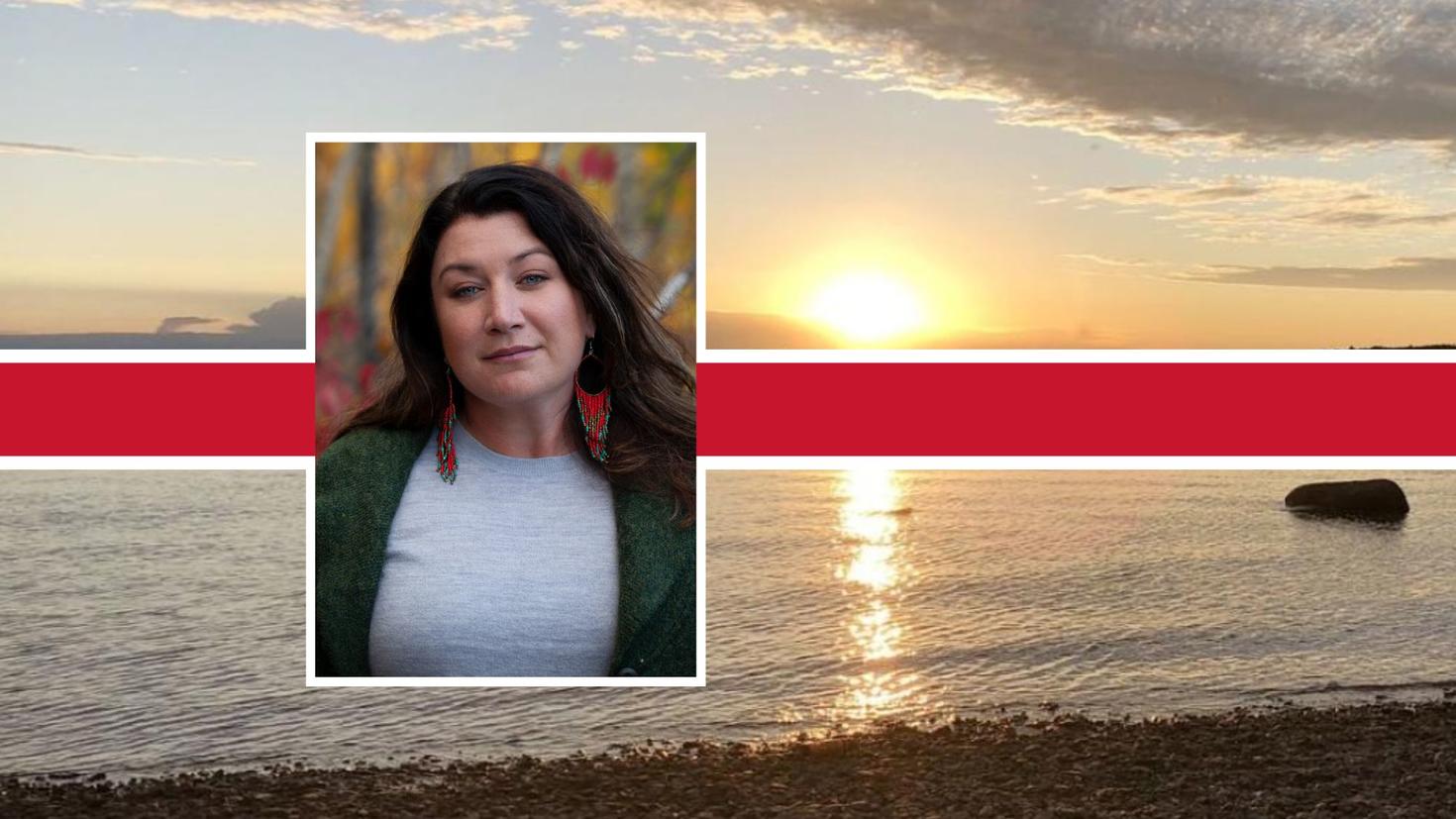 Portrait of a woman with a lake background