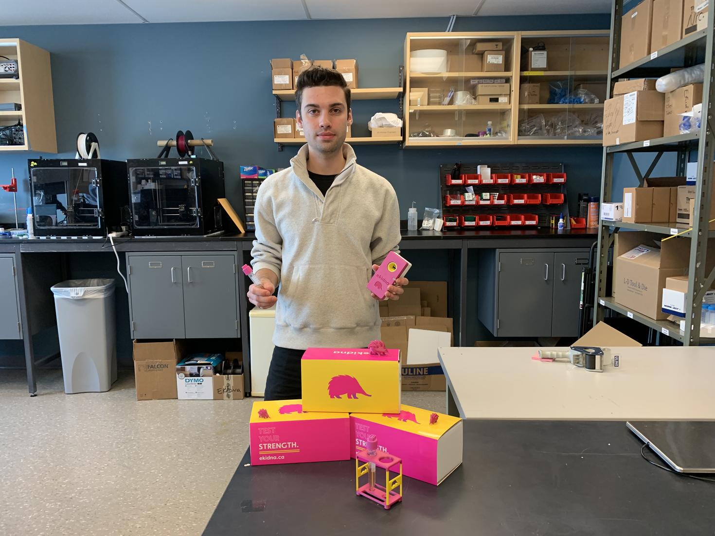 Nic Boileau poses with Ekidna products in a lab