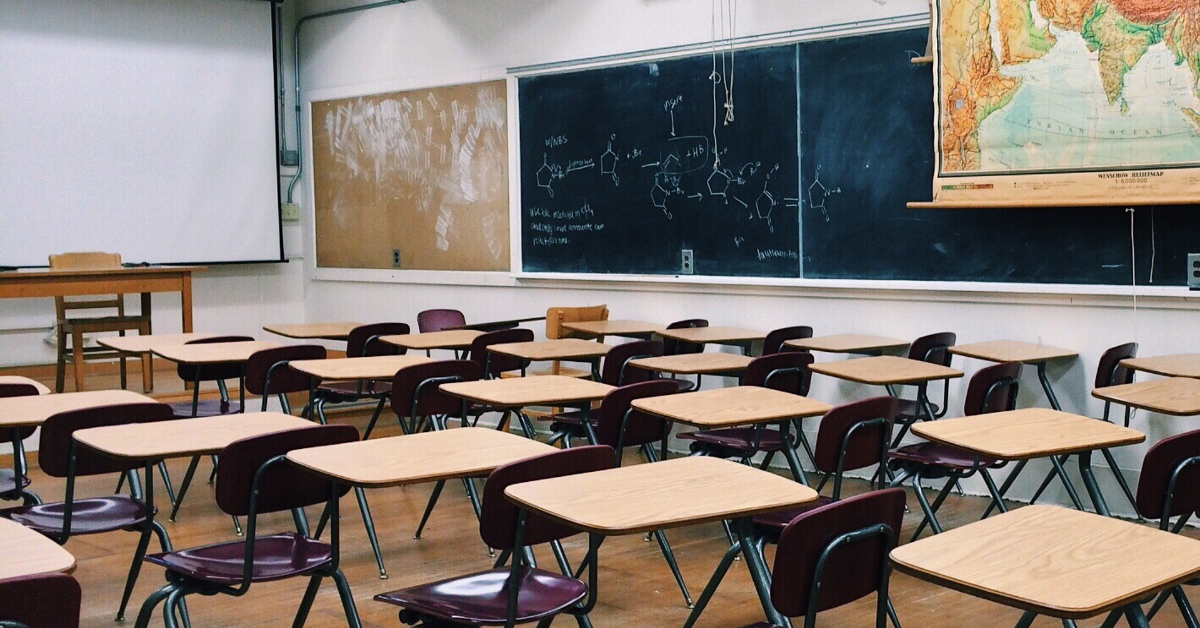 Empty classroom with blackboard.