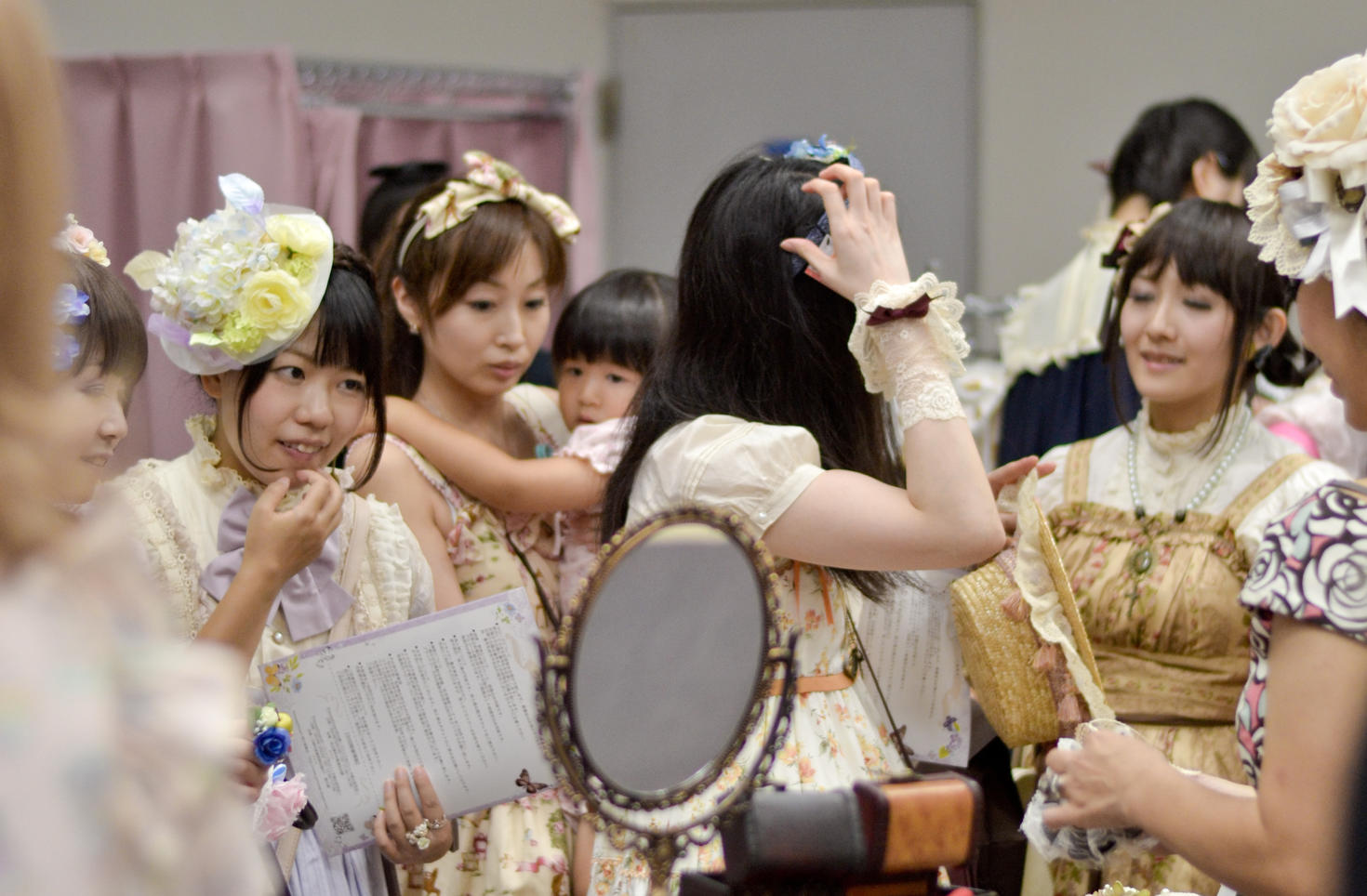 People wearing dresses and costumes