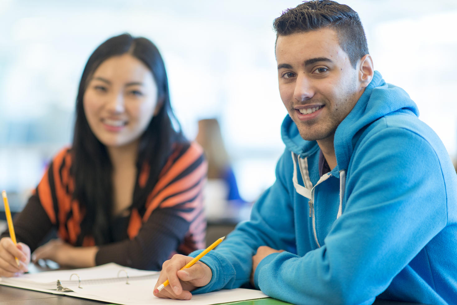 Two graduate students in class.