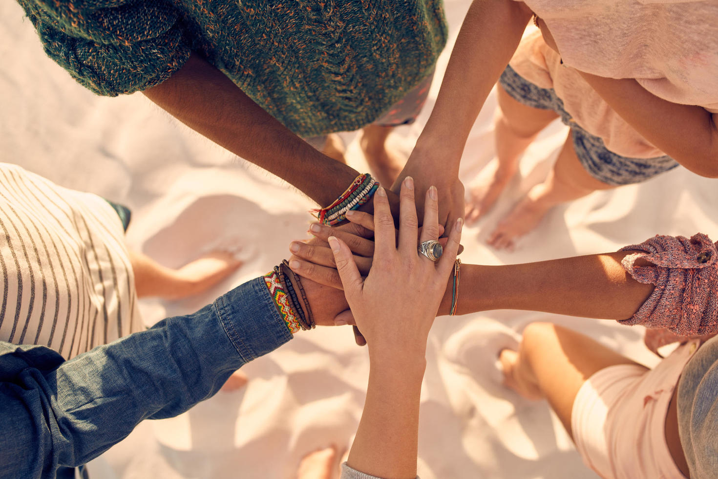 People in hands of unity