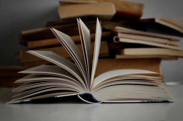 Open book on table.