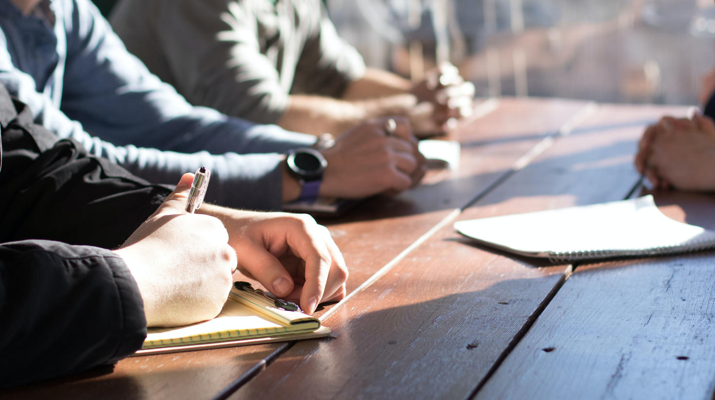 Group of students taking notes