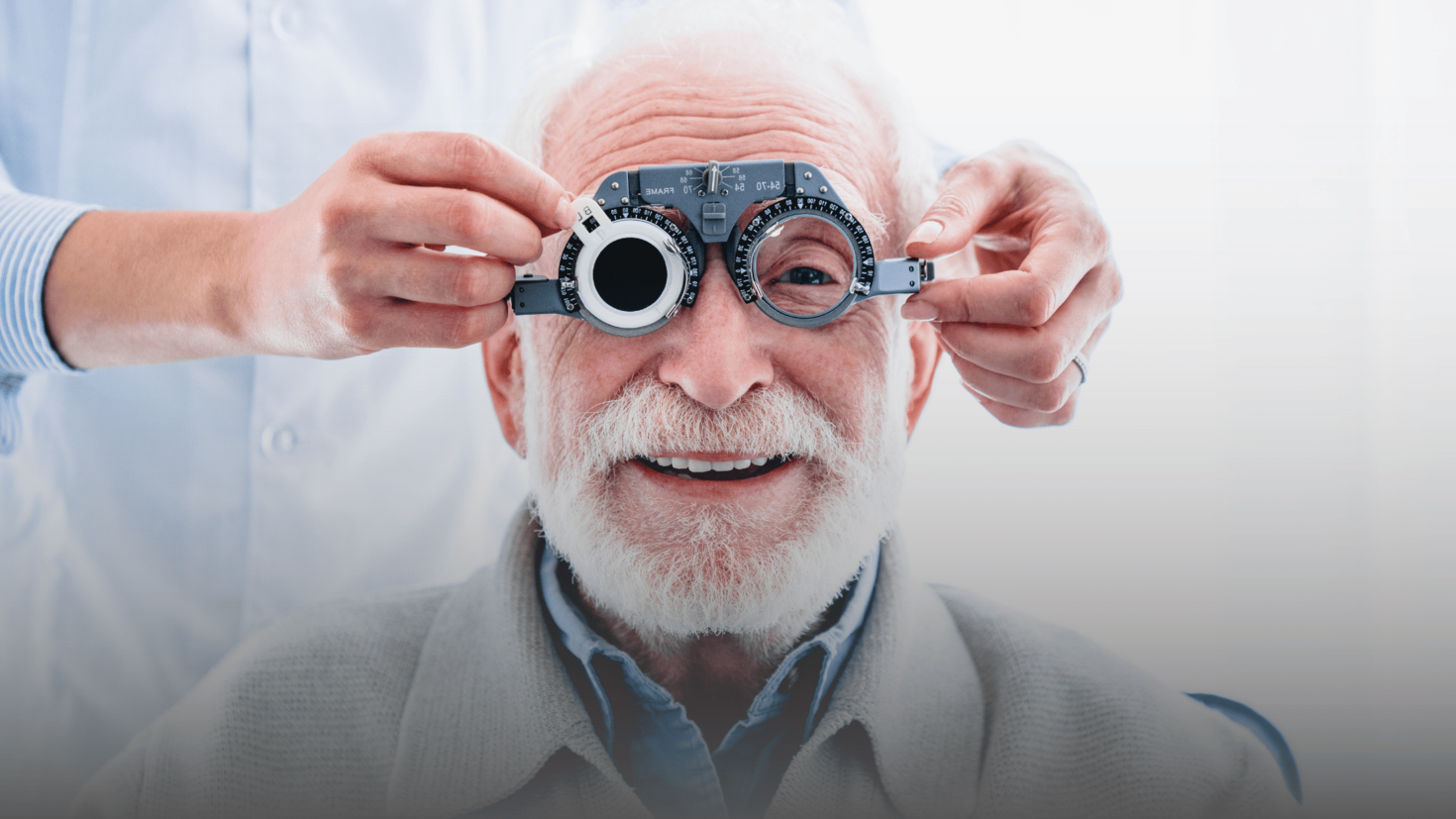 elderly man having an eye test