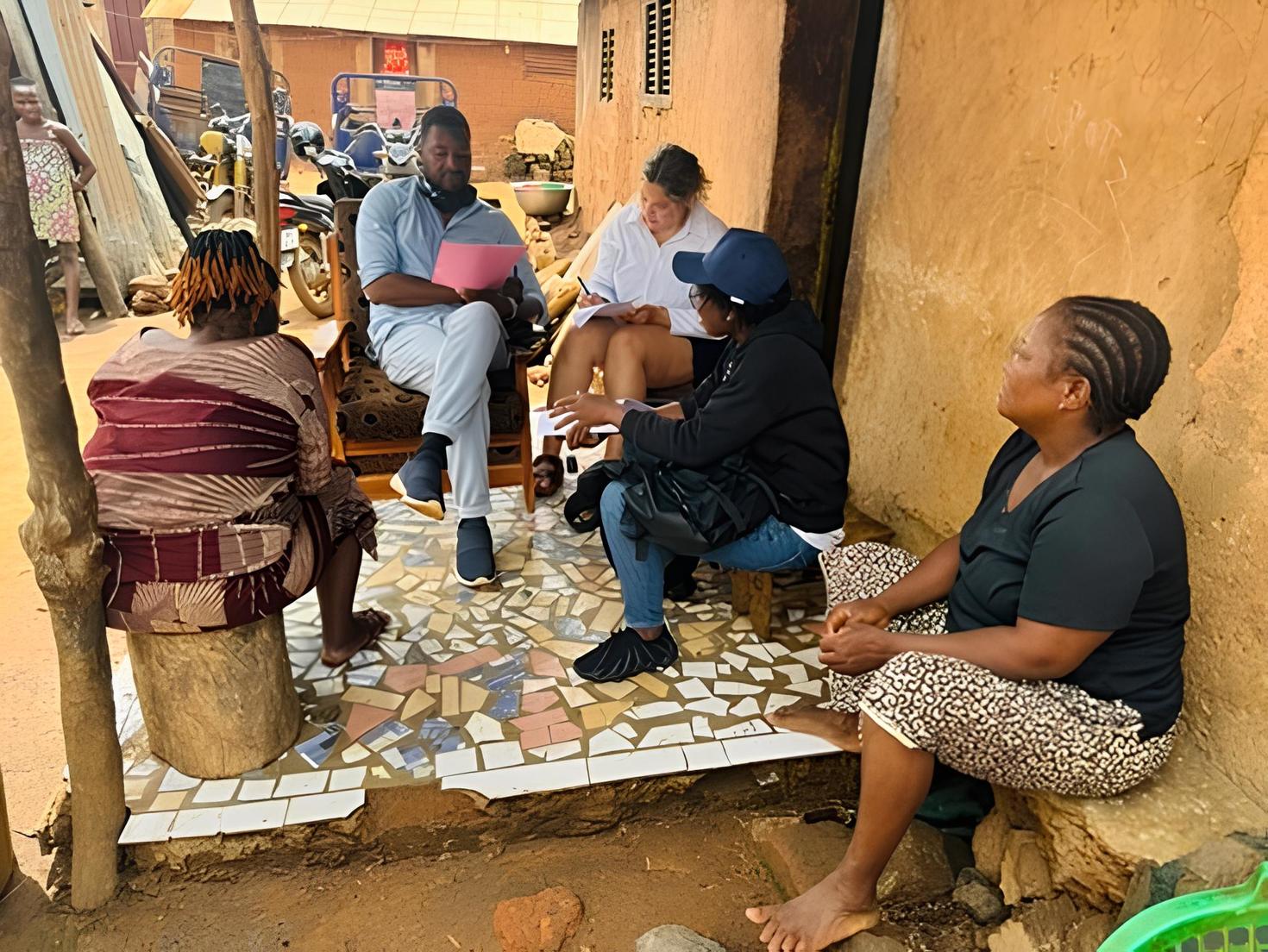 African women sitting and having a conversation.