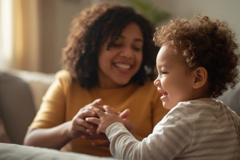 woman playing with child 