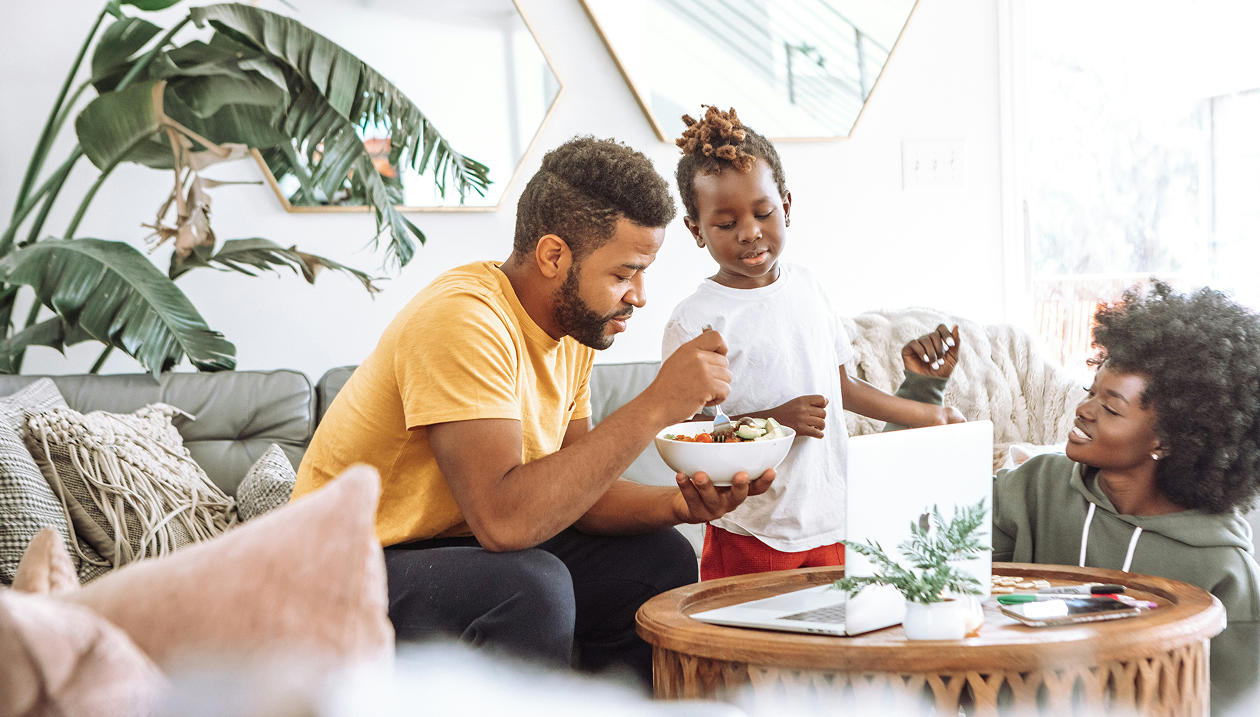 Family eating breakfast together