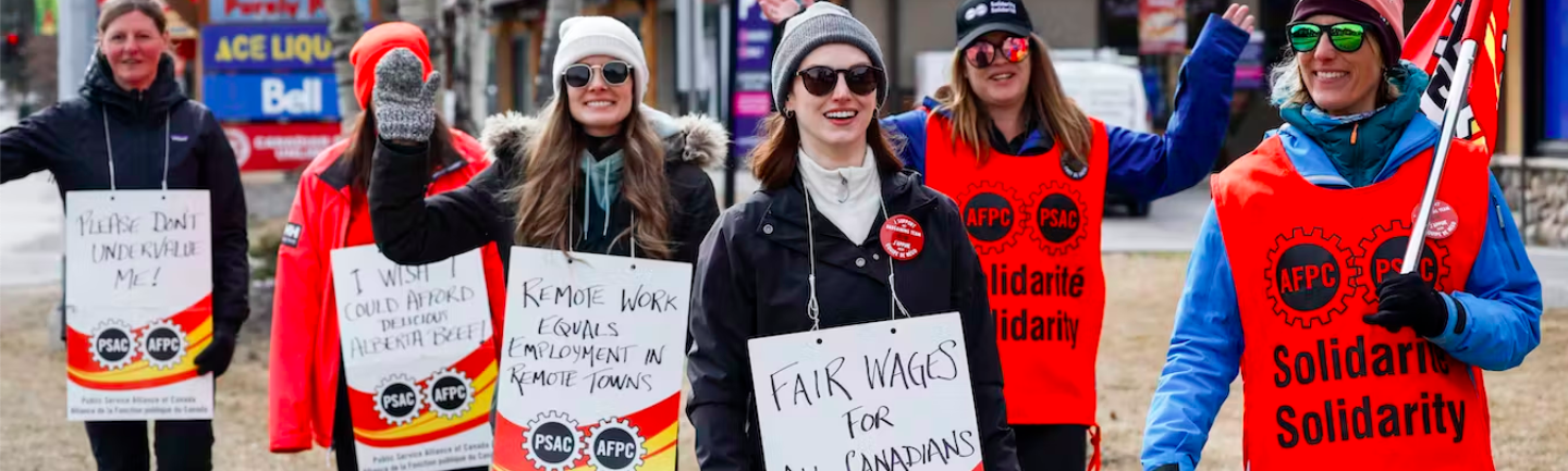 Members of the Public Service Alliance of Canada picket outside a Service Canada office in Canmore, Alta., in April 2023. More than 150,000 federal public-service workers are on strike across the country after talks with the government failed. Remote work is a negotiation issue. THE CANADIAN PRESS/Jeff McIntosh