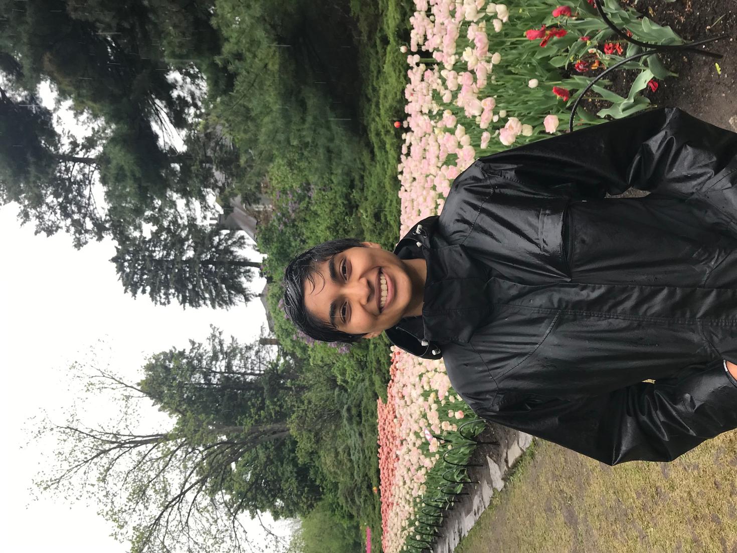 Kiran in front of tulips