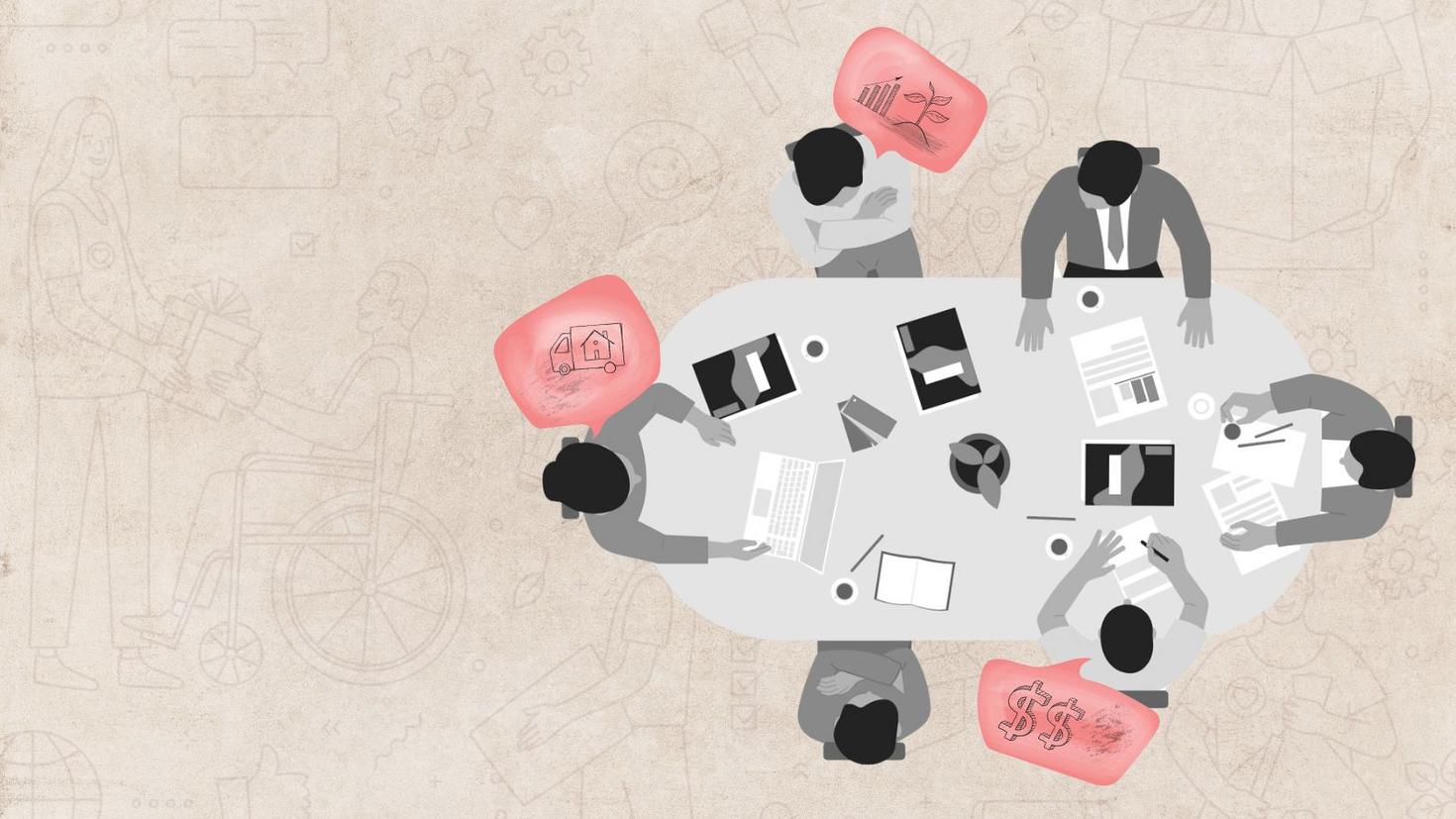 Vue de dessus d'un remue-méninges d'équipe autour d'une table de réunion.