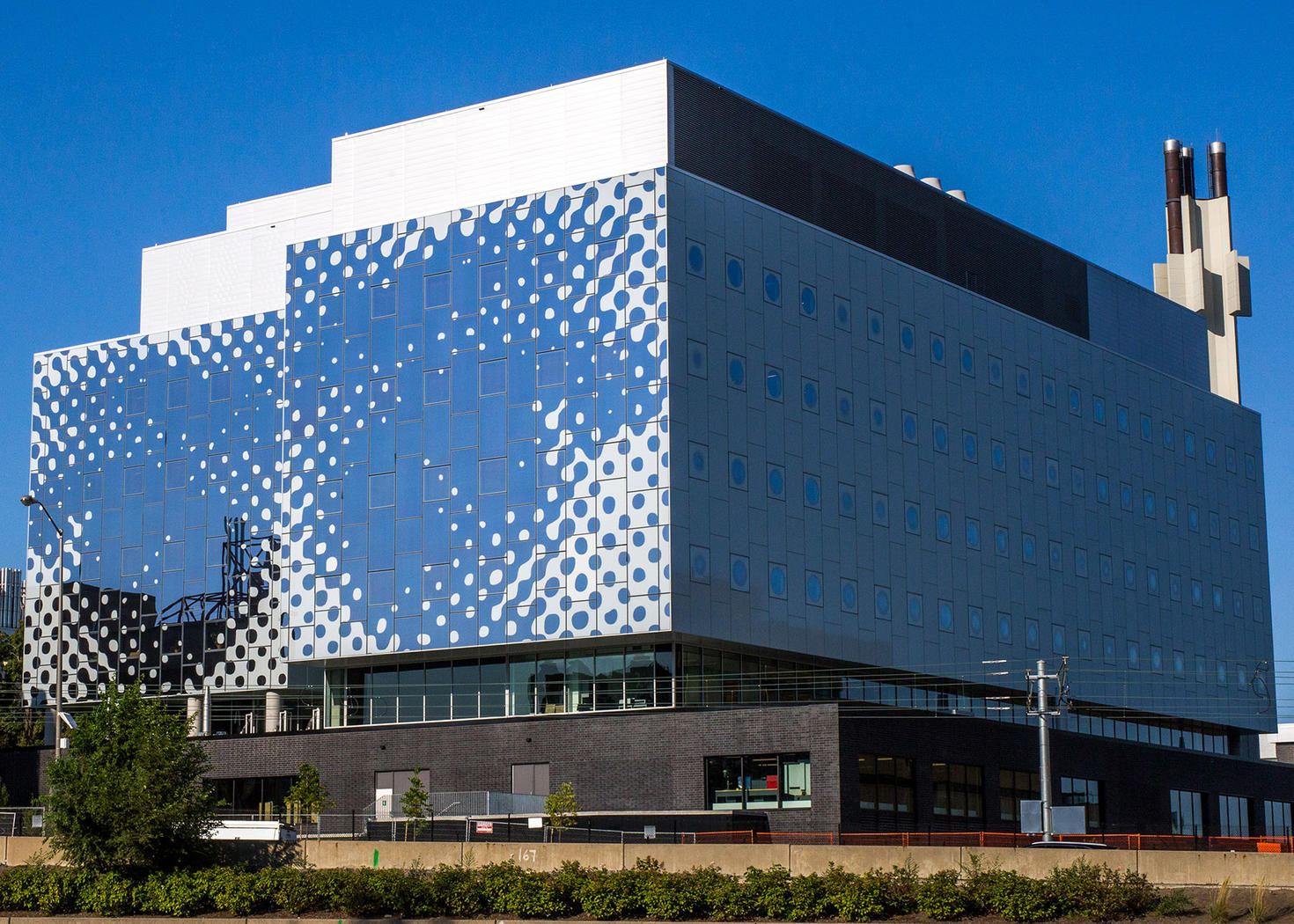 Les Yeux reinterpreted on the glass exterior of the STEM Complex