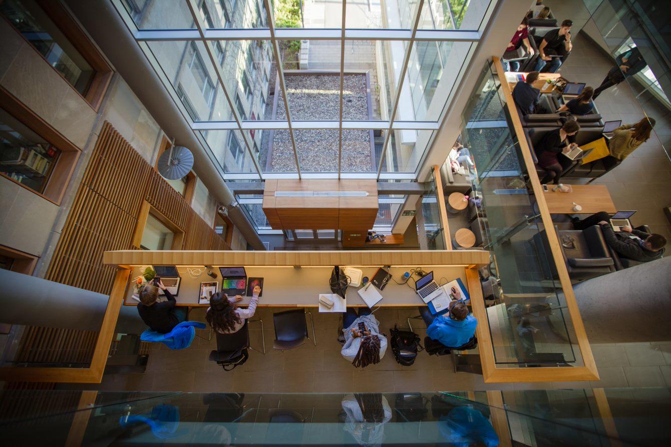 Overhead shot of students studying in a common space