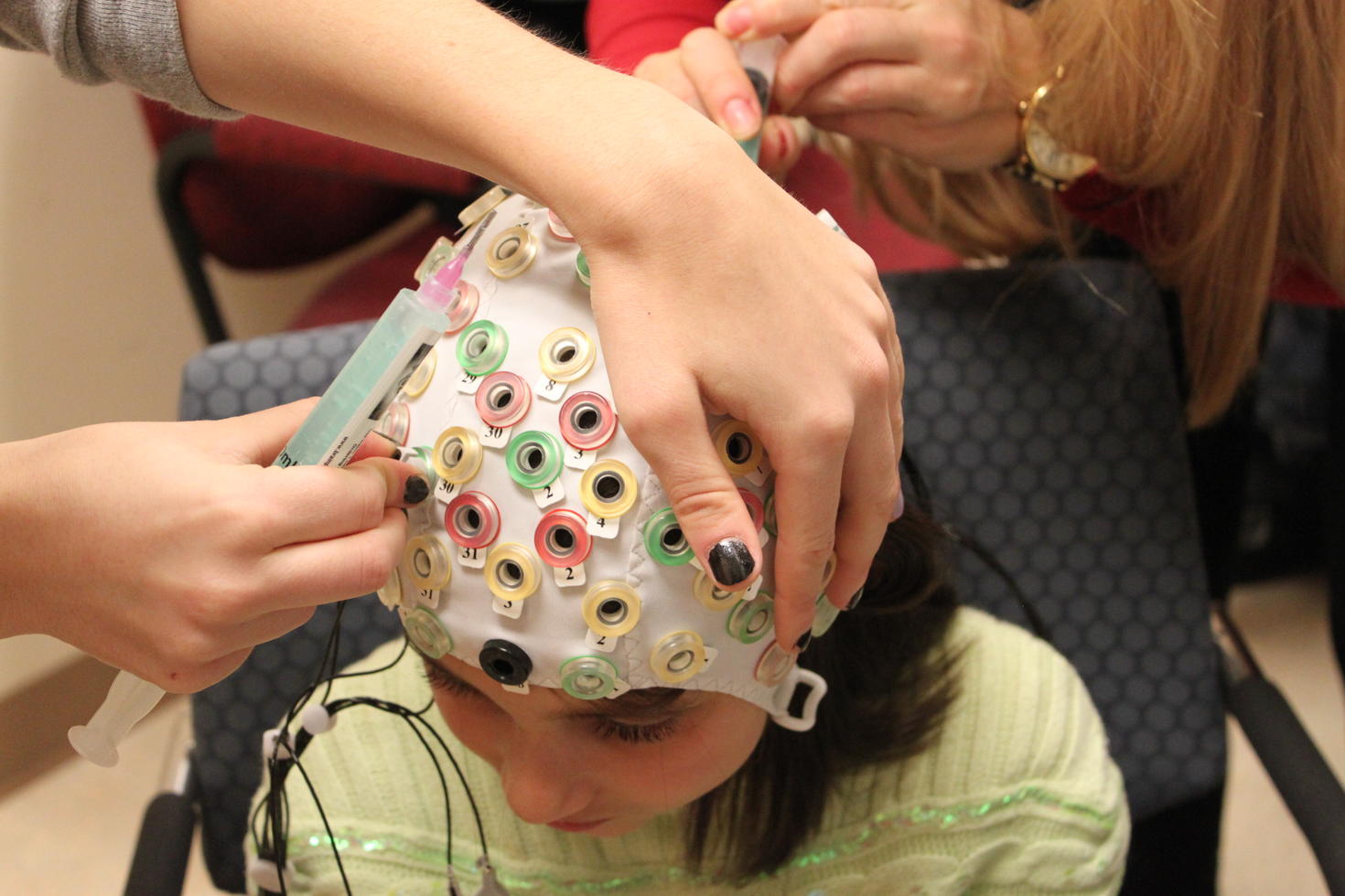 research participant with ECG cap