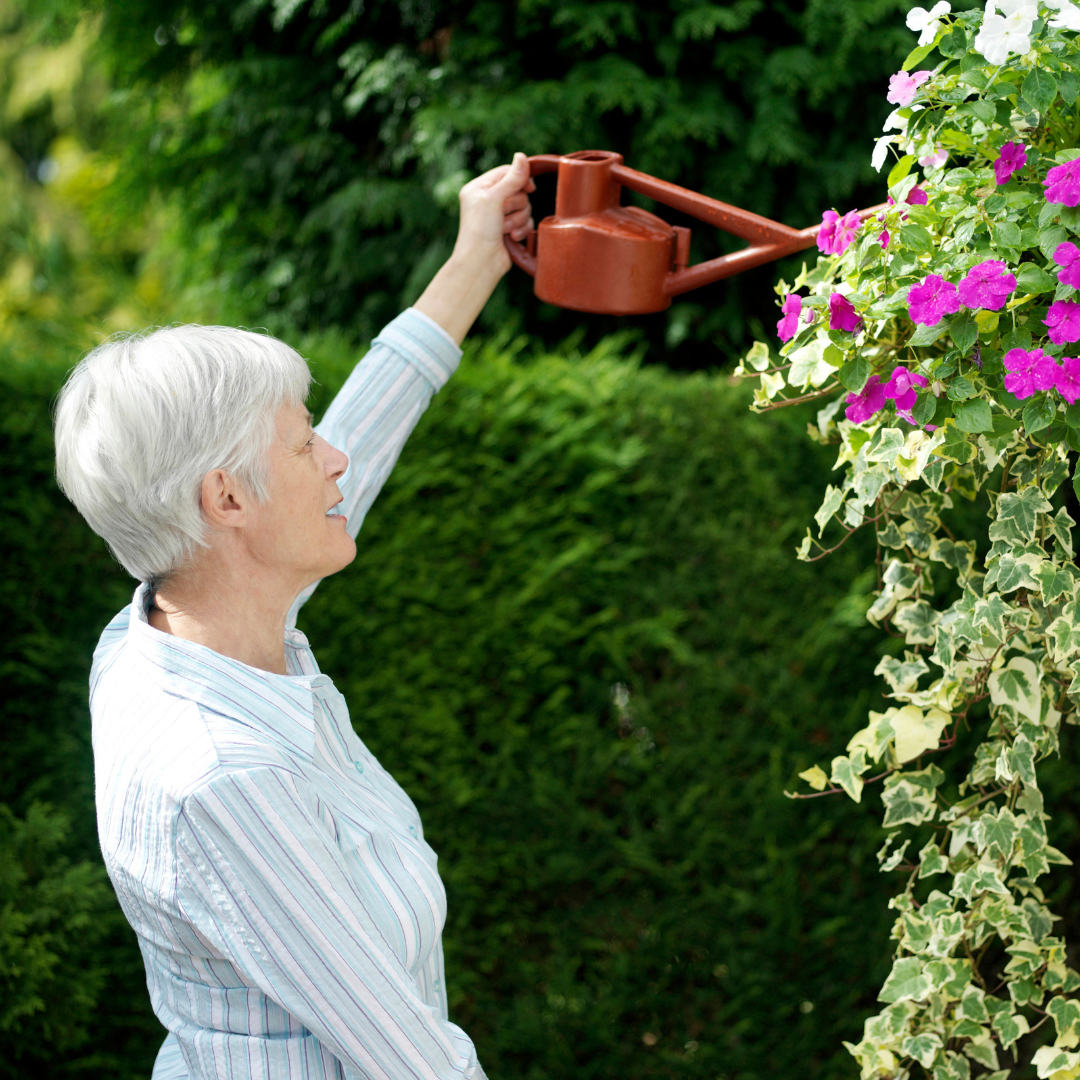 woman watering flowers