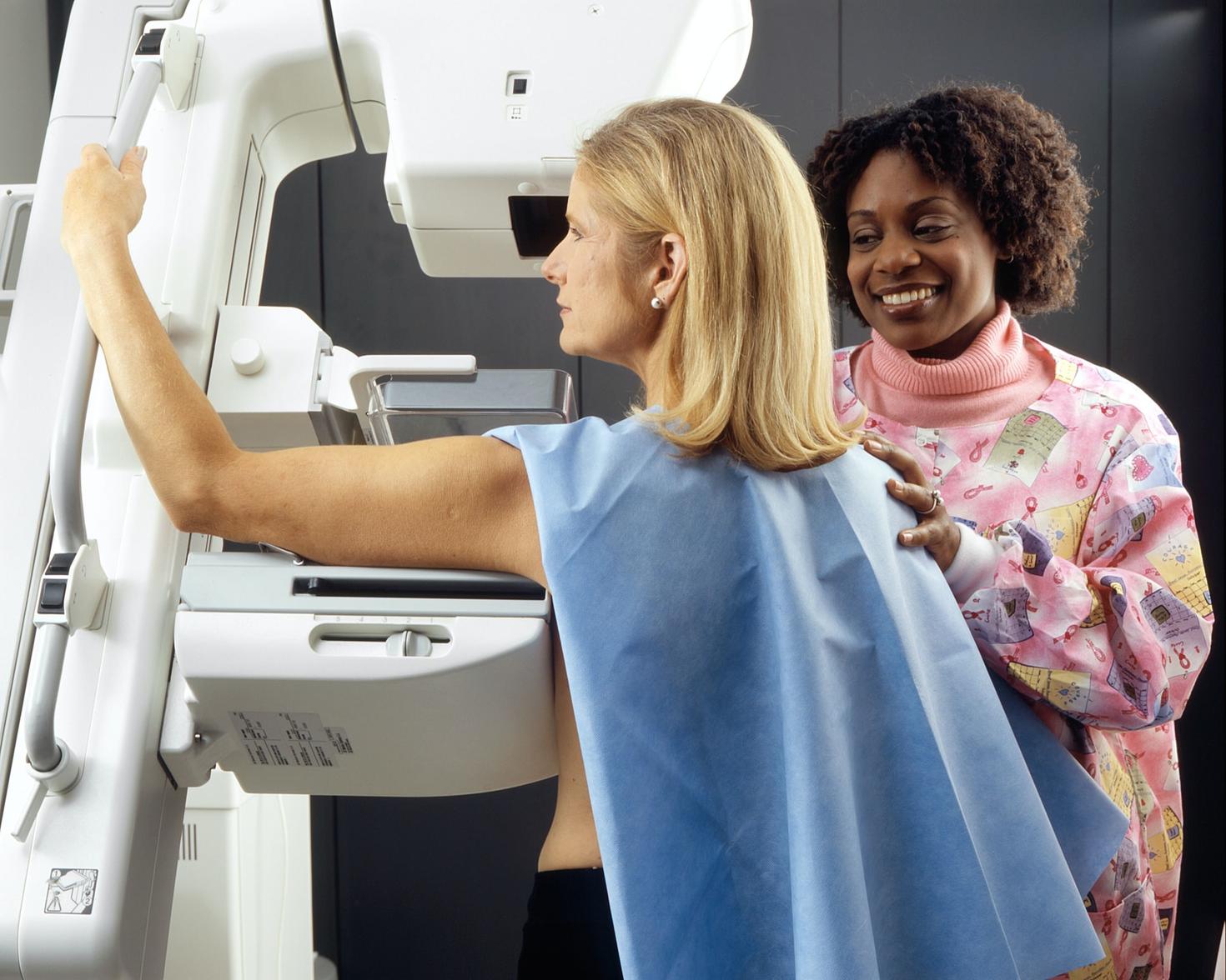 Older woman undergoing breast cancer screening