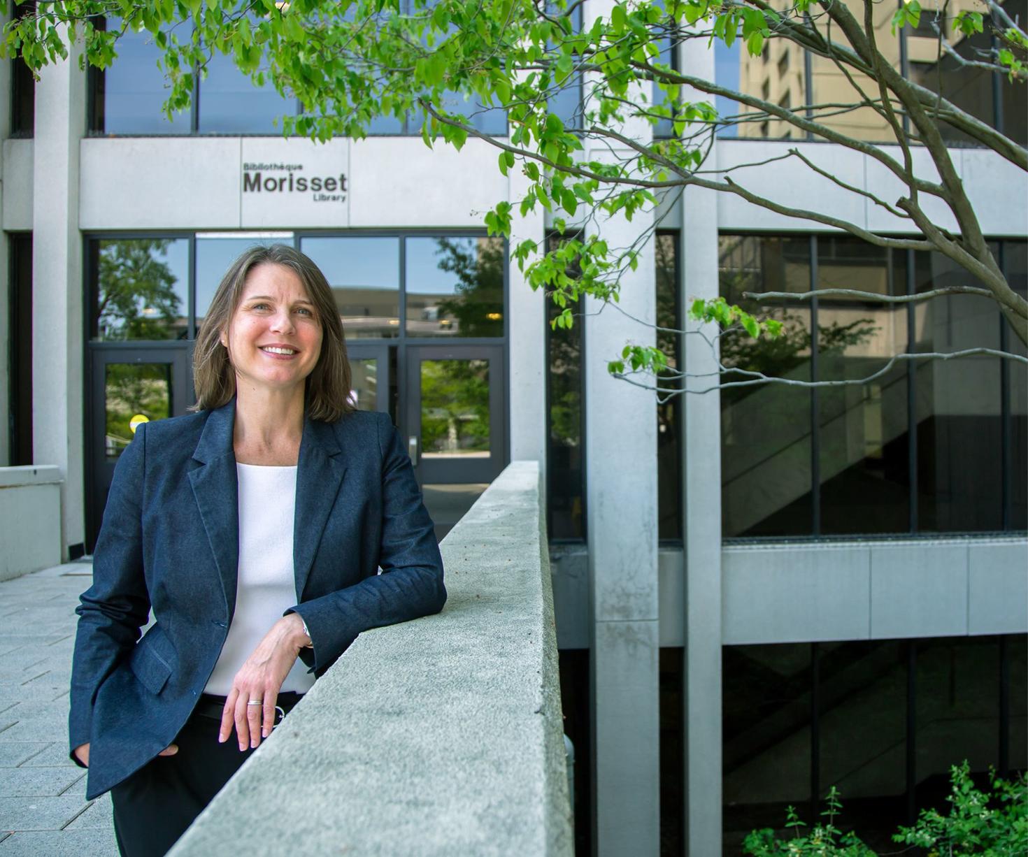 Caroline Hyslop, associate university librarian and academic director of the ORDC at uOttawa, in front of the Morisset Library, home to the ORDC.