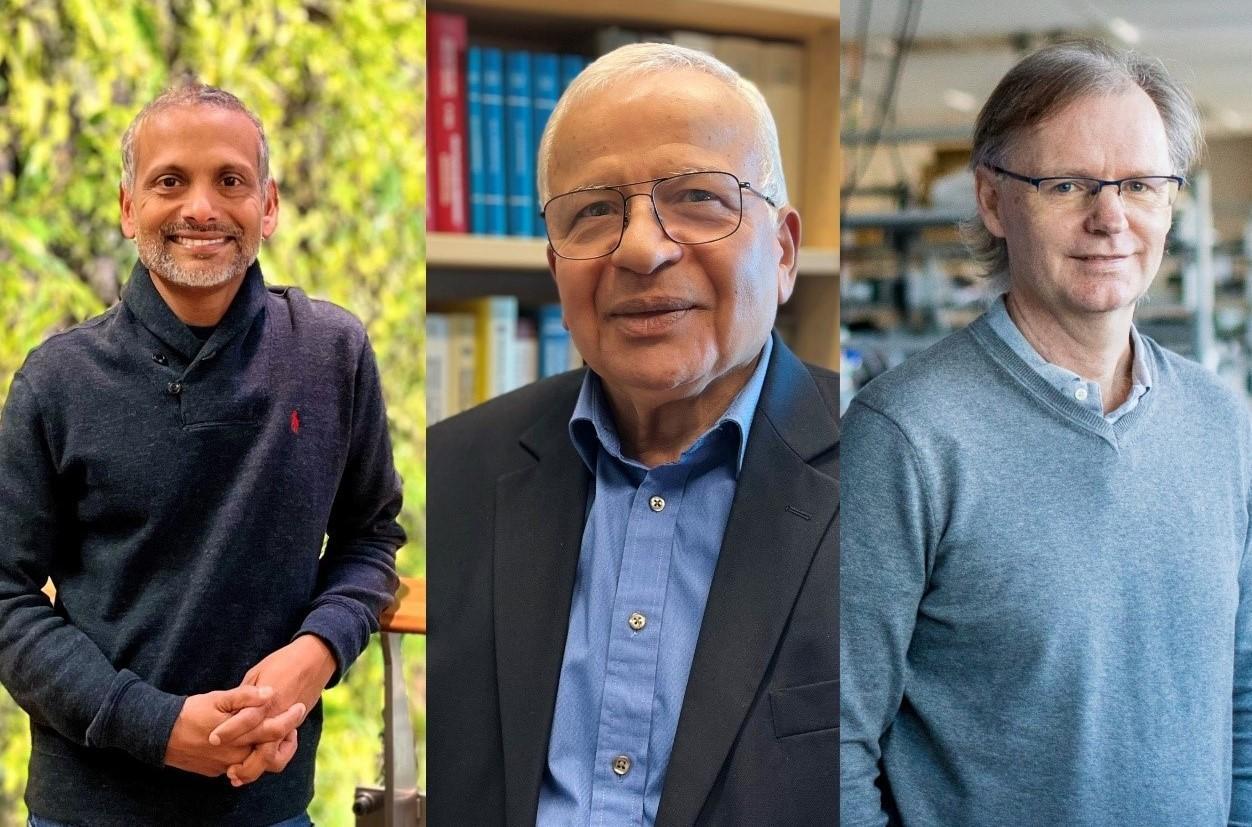 (from left to right) Professor Muralee Murugesu, Professor Abdelhamid Sayari, and Professor Michael Organ, wearing a light blue sweater, is standing in his laboratory.