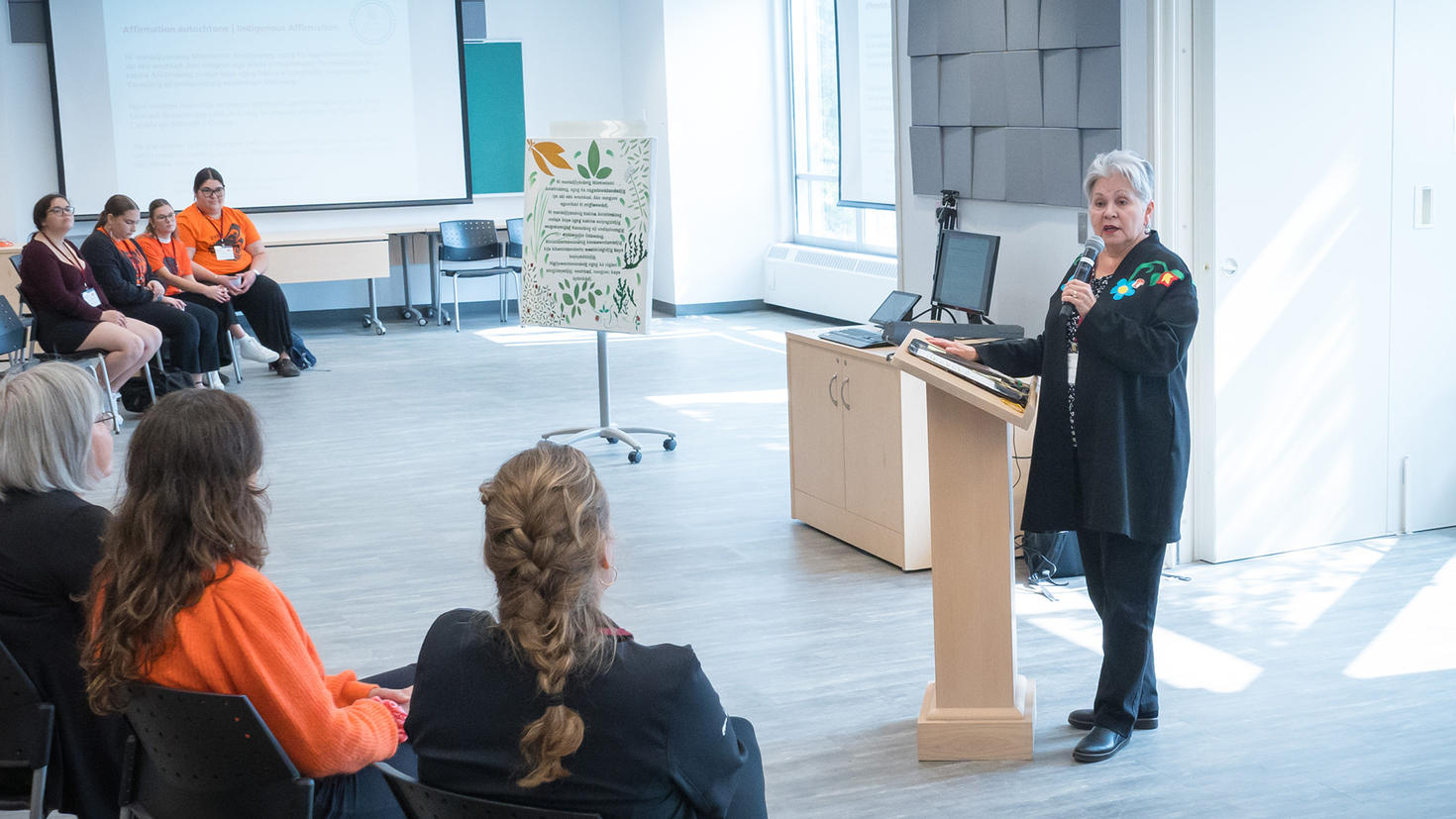 uOttawa Chancellor Claudette Commanda addresses a roomful of people
