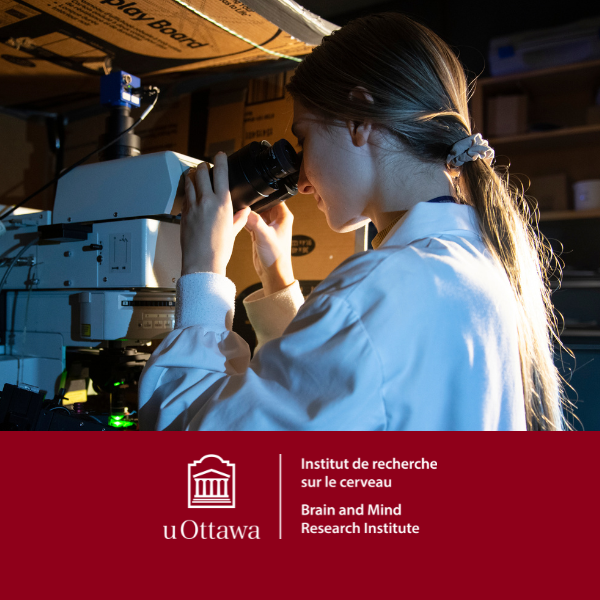 A woman in a lab code using a microscope with the uobmri logo on a red banner.