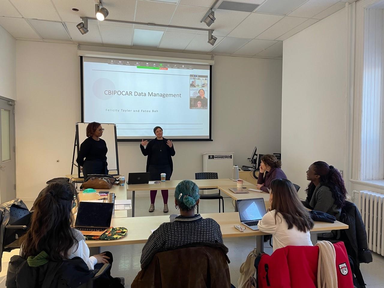 Students attending a class presentation
