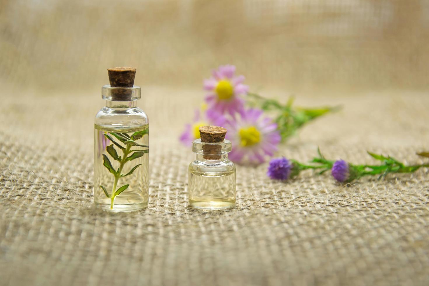 bottles of fragrances on a cloth mat