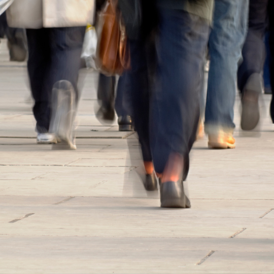 Close-up of people walking