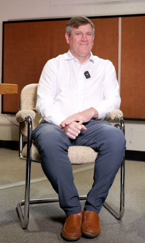 Michael Mulvey Sitting on a Chair