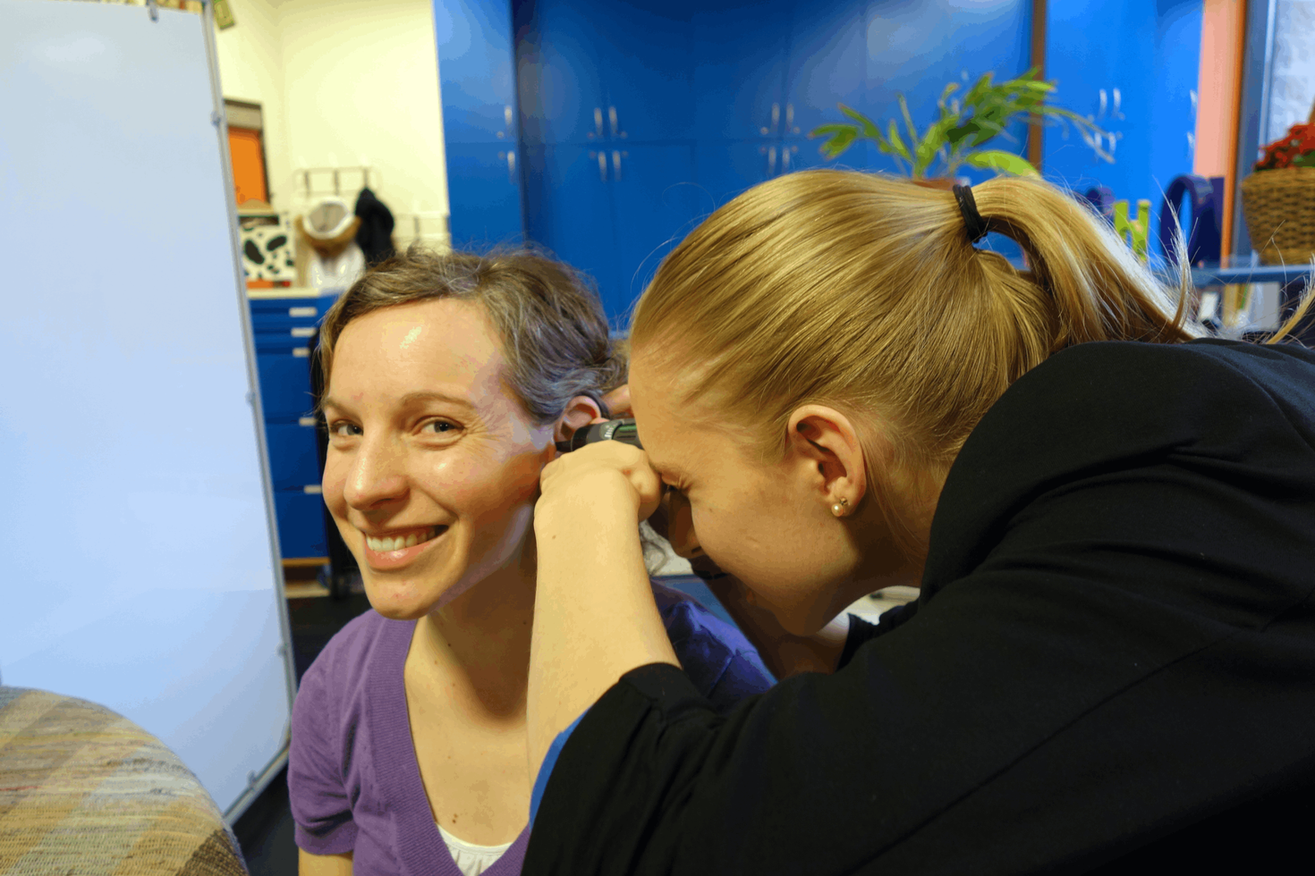 Student with audiology equipment