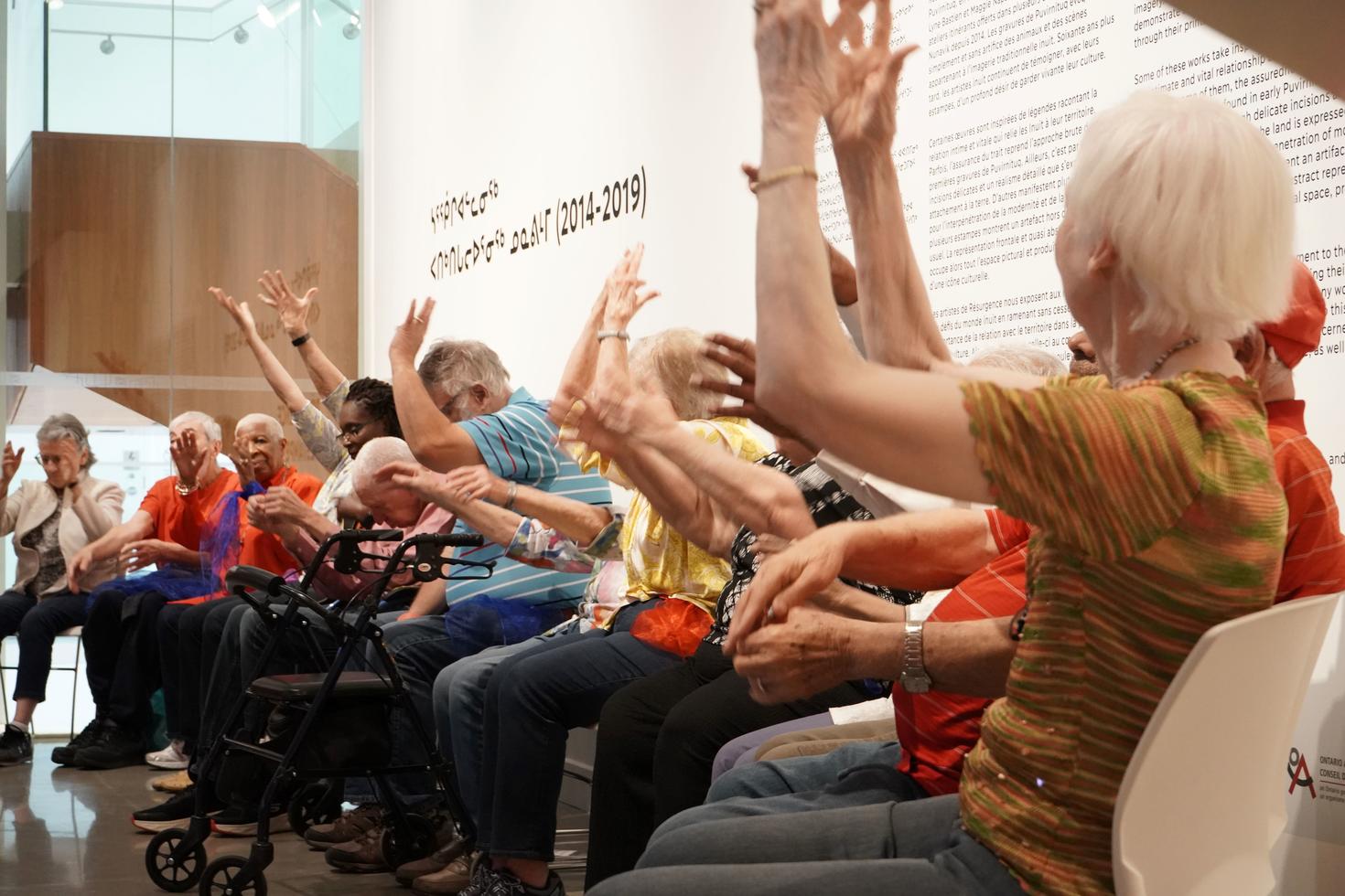 Participants were sitting in the music and movement event at Ottawa Art Gallery