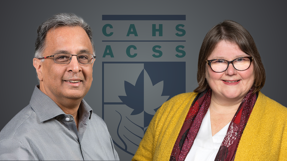Dr. Rashmi Kothary and Dr. Melissa Brouwers in front of the logo of the Canadian Academy of Health Sciences