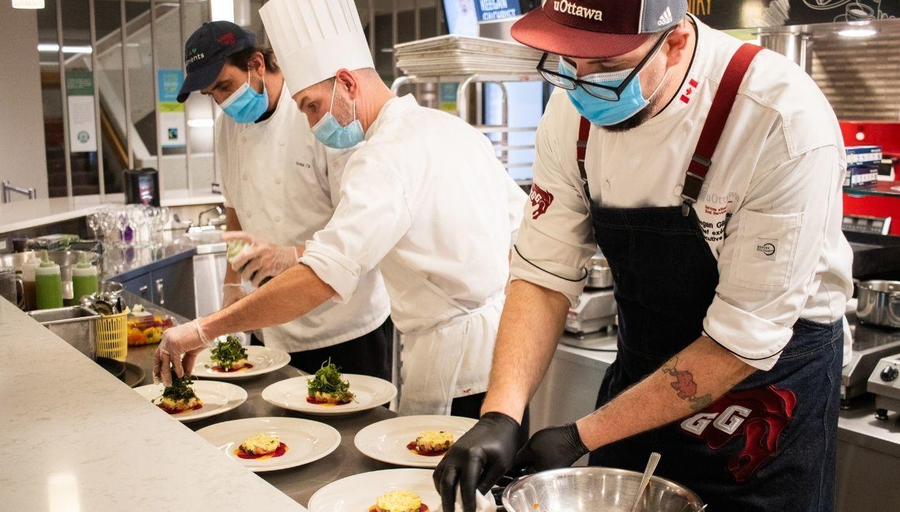 uOttawa chefs preparing food in the UCU Dining Hall