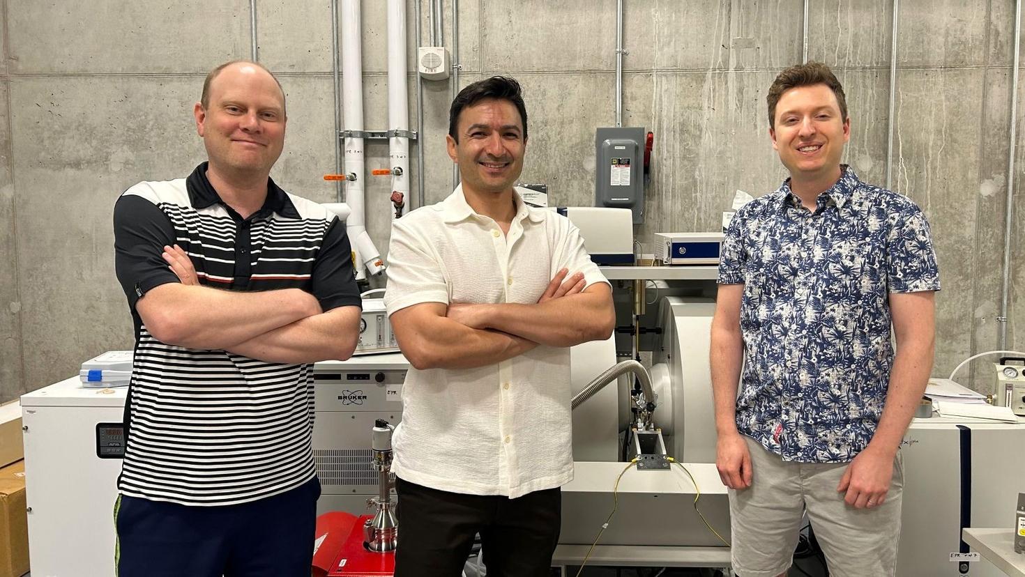 Professor David Bryce, Alireza Nari and Patrick Szell in front of an electron paramagnetic resonance (EPR) spectrometer.